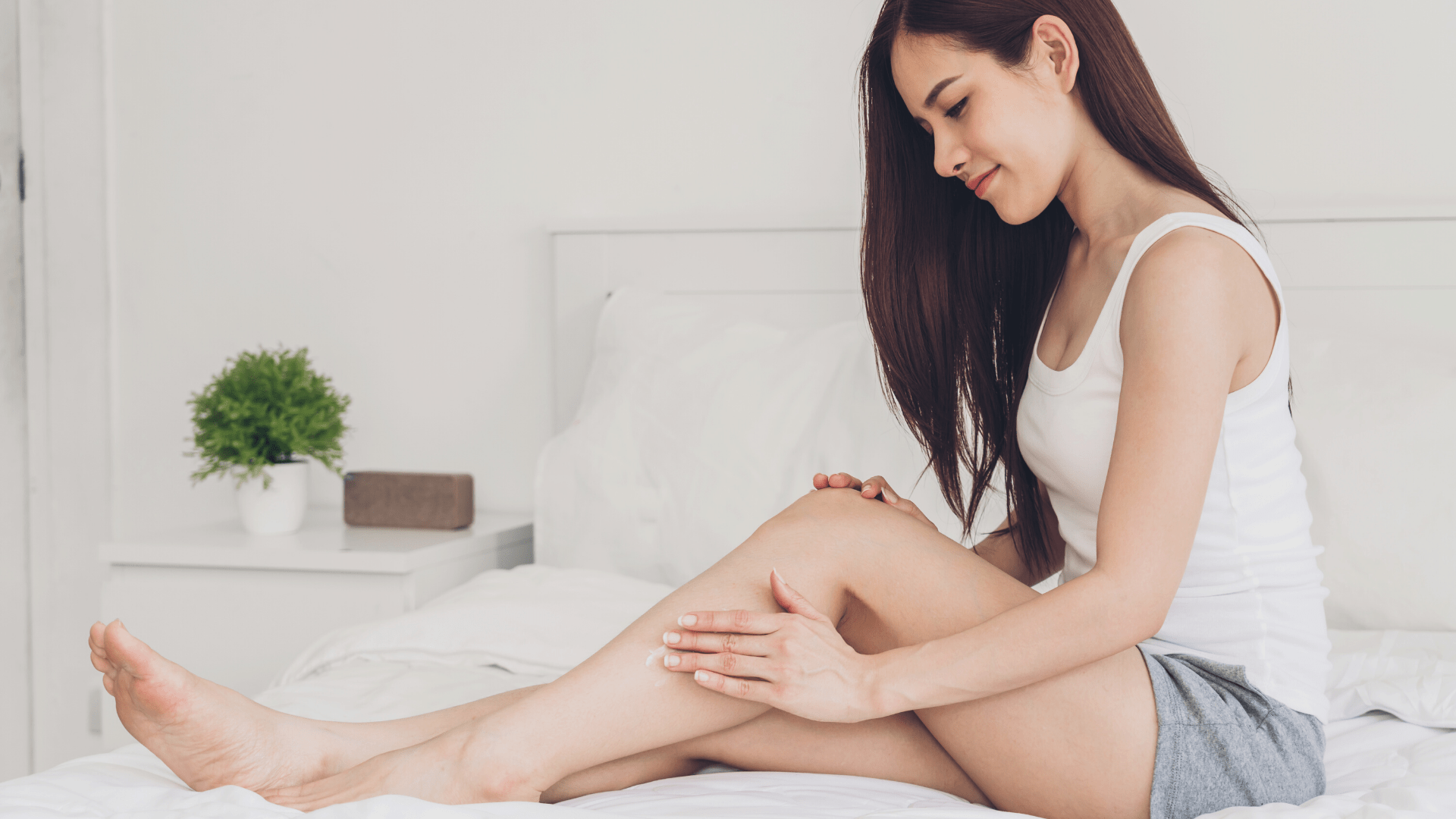 women applying natural tallow moisturizer to legs 