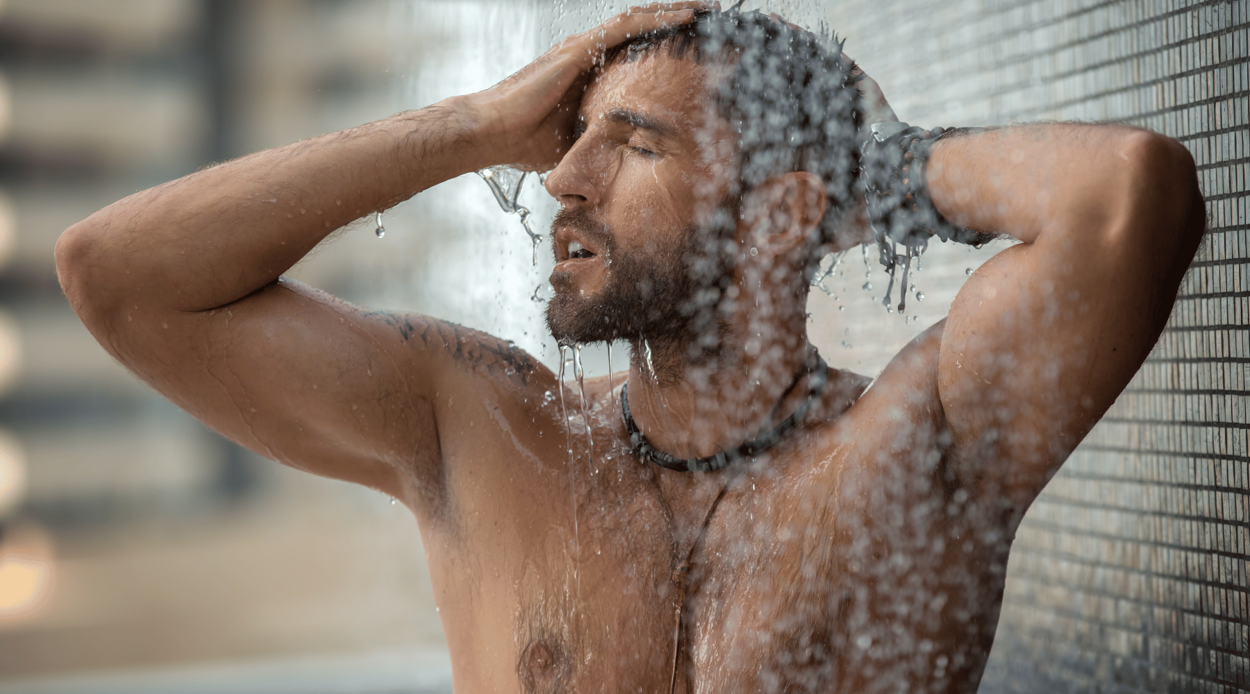 man taking mindful shower