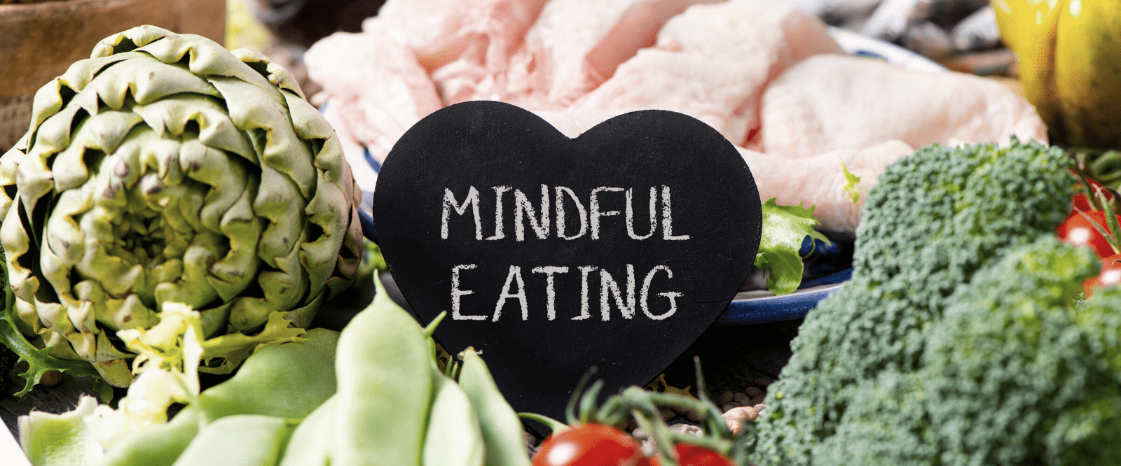 mindful eating sign surrounded by fresh foods donating by nefertem holistic skincare