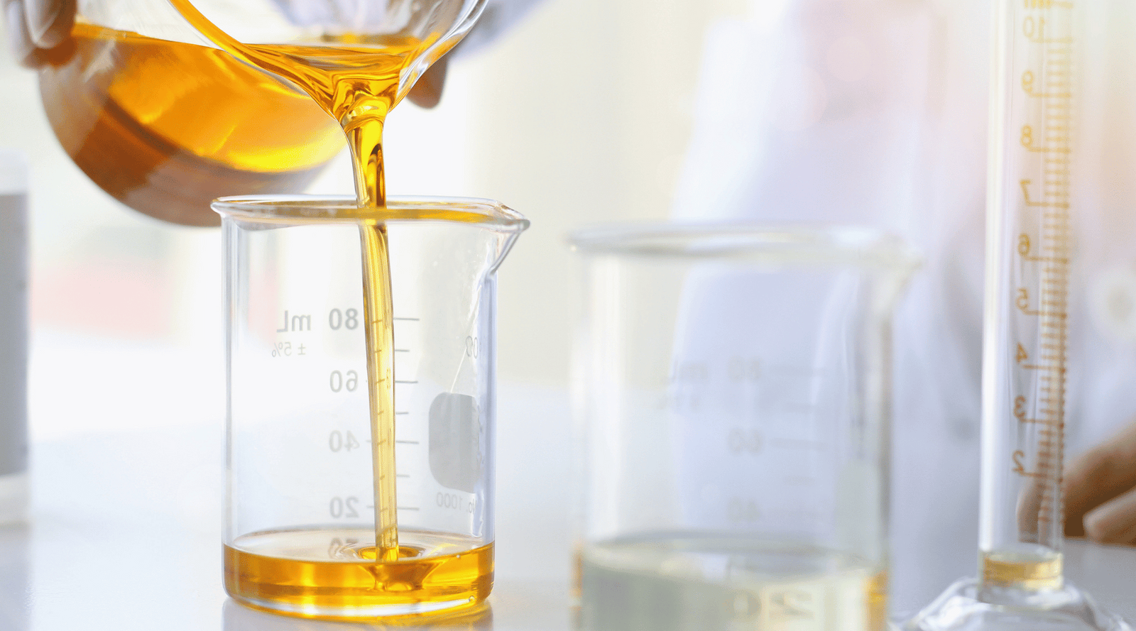 CLA for skin poured into science beaker