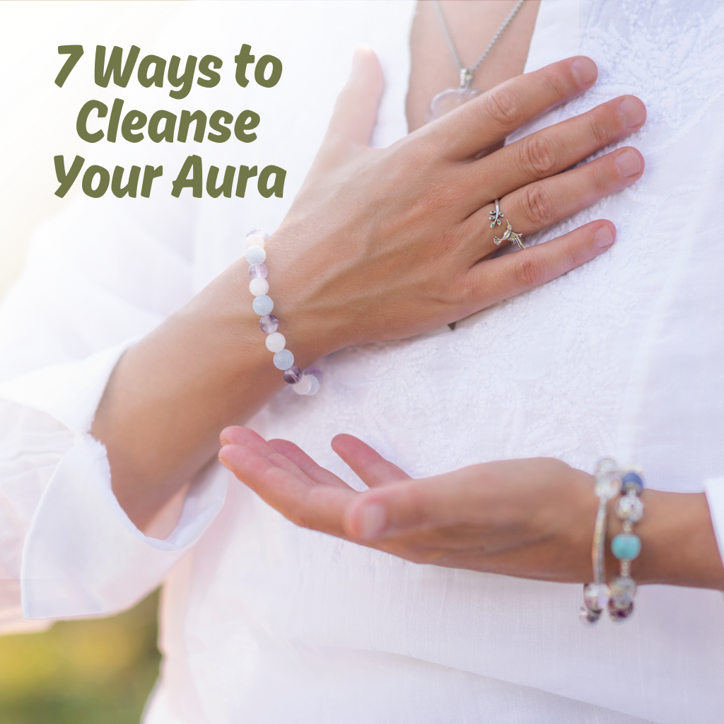 woman with hand over heart for aura cleansing