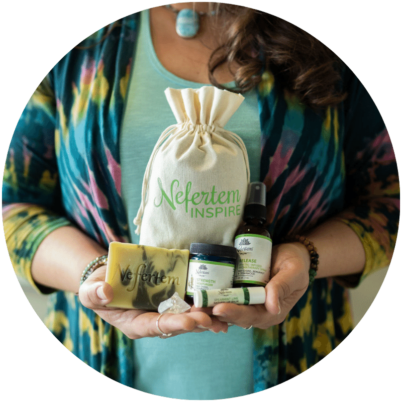woman holding intention kit of natural skincare