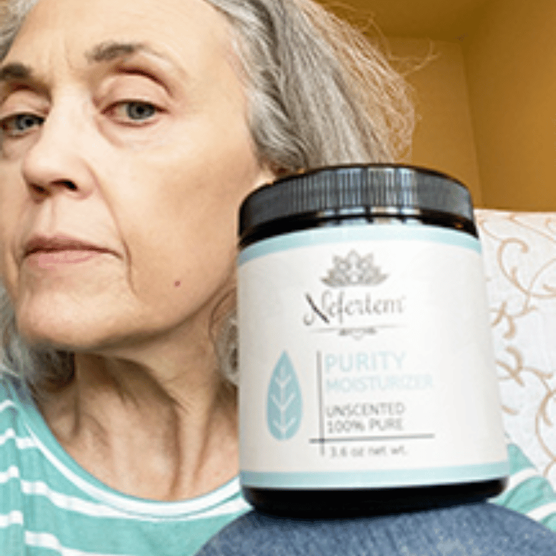 woman holding purity natural moisturizer