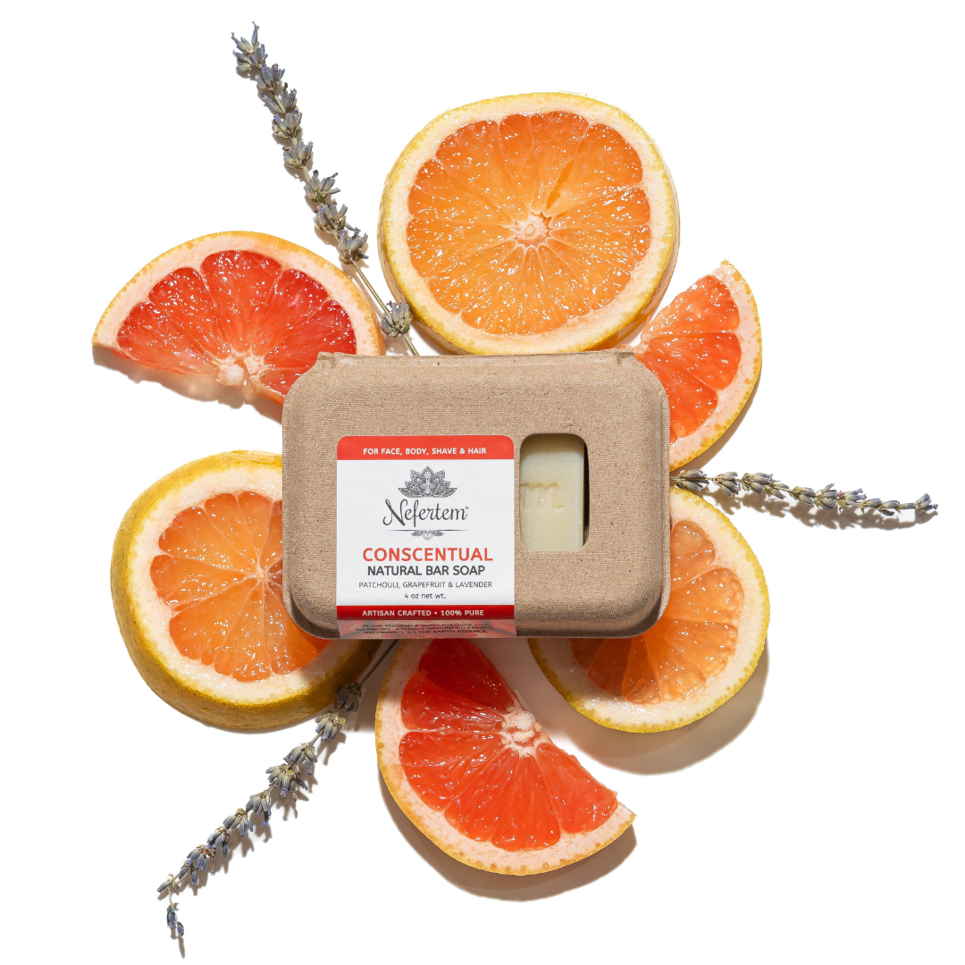 tallow soap for face and body surrounded by fresh fruit