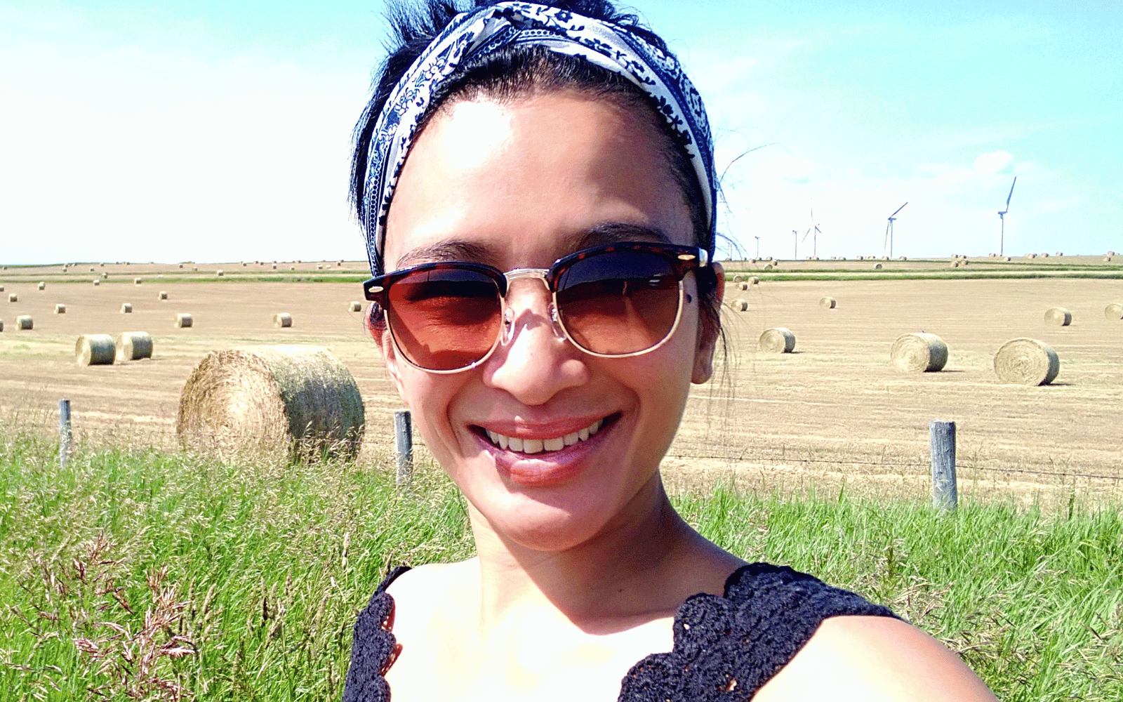 happy woman outside in field