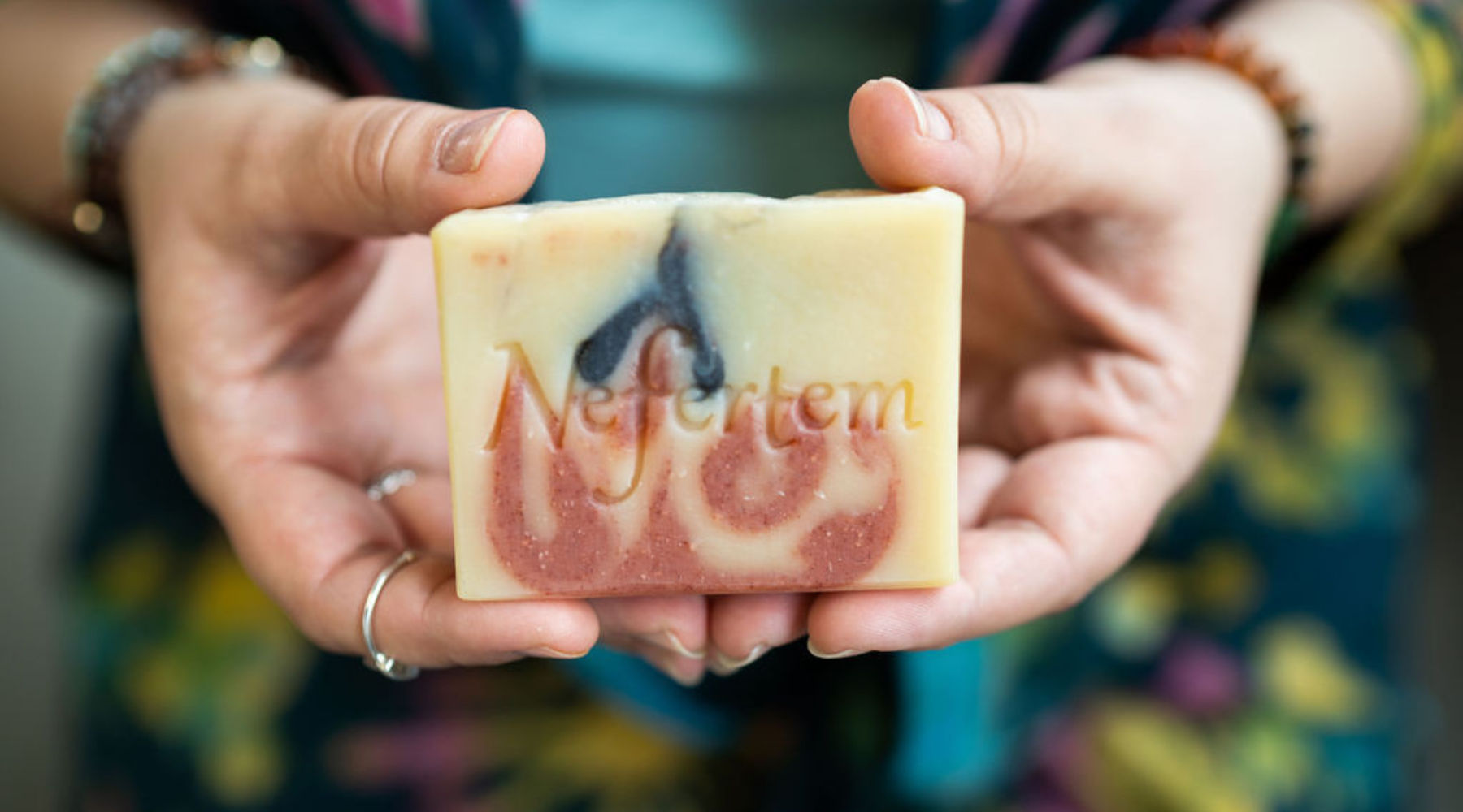 holding soap in hand made by Nefertem