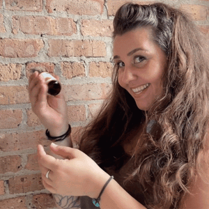 woman spraying aromatherapy sprays